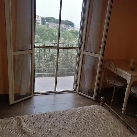 Quarto em Acomodações Particulares Casa Chiara Scilla